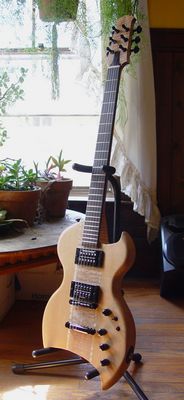 front view of a custom commisioned sitka spruce electric guitar made by michael mccarten